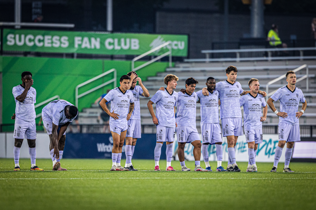 Velocity FC line up for a Penalty shootout in lilac kits