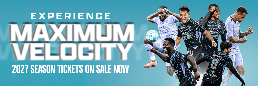 Promotional banner for a sports team featuring players in action with the text 'Experience Maximum Velocity' and '2027 Season Tickets on Sale Now.'